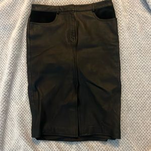 DKNY size 8 Leather skirt. Thick and comfortable material with some stretch.